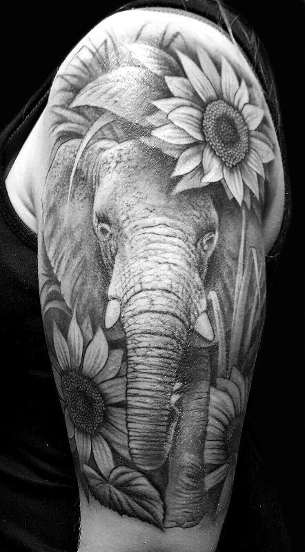Elephant With Sunflowers By Audi Tattoos